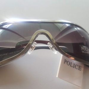 POLICE SUNGLASSES MODEL TZ8711 75/13/125 100% UV